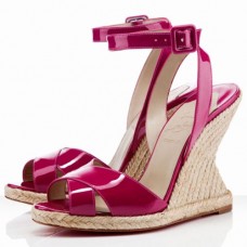 Sandalias de cuña Christian Louboutin You Love de 120 mm en color rosa matador. Sandalias de cuña Christian Louboutin You Love de 120 mm en color rosa matador.